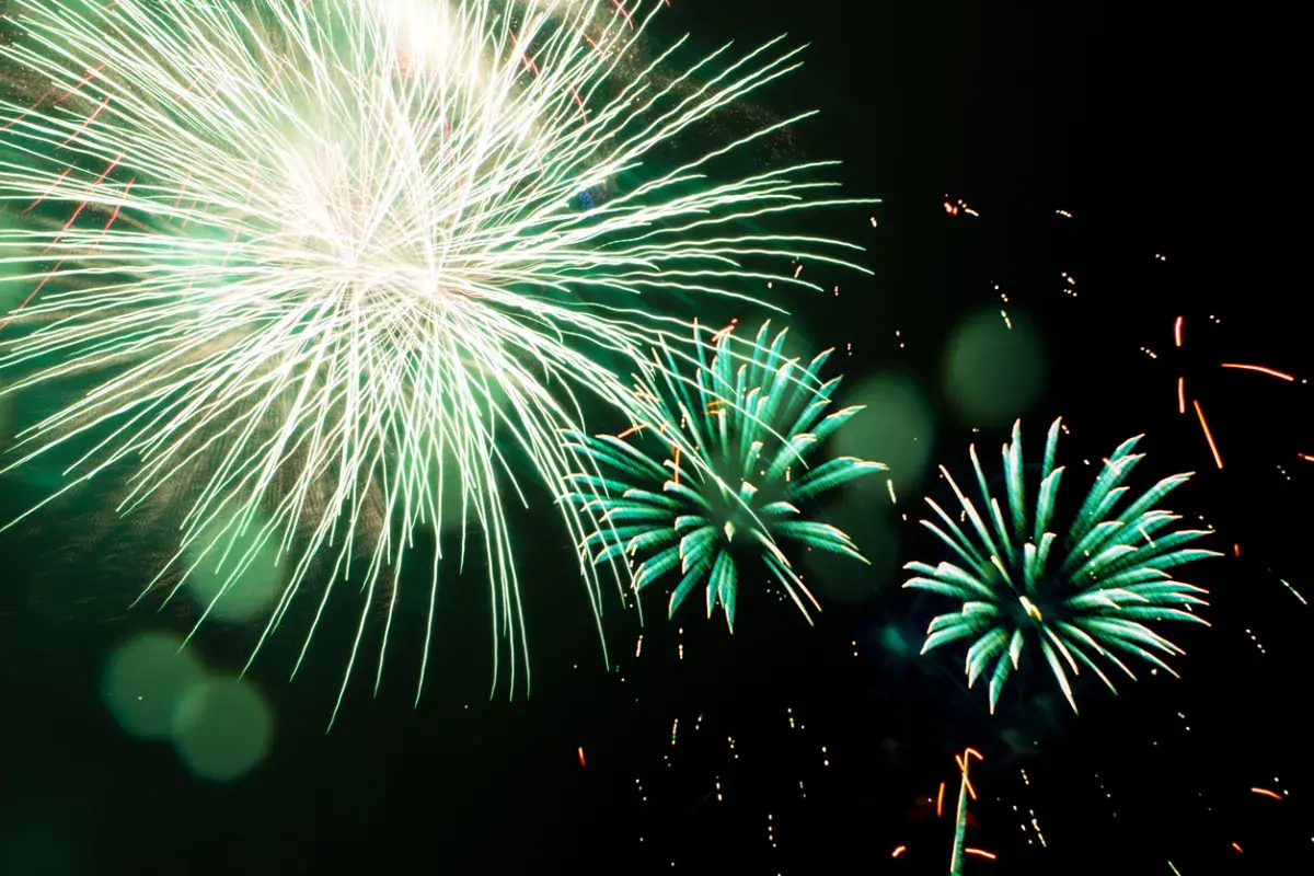 Green fireworks at night